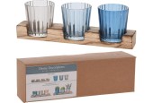 Theelichthouderset glas op houten plank