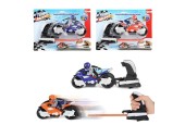 Toi Toys Turbo Racers tirant sur une moto avec un motocycliste
