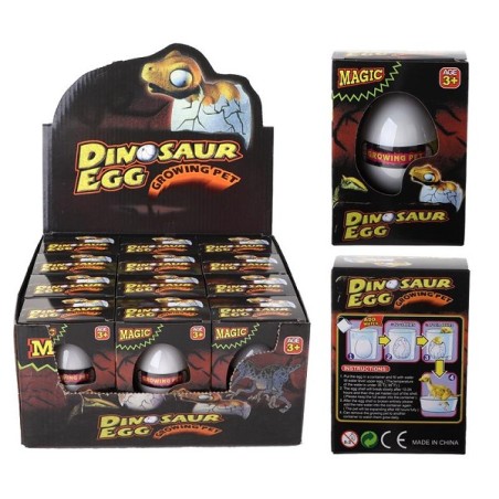Oeuf de croissance de dinosaure en boîte
